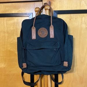 Fjallraven navy and brown kanken backpack